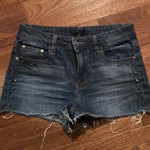 Dark wash denim studded jean shorts